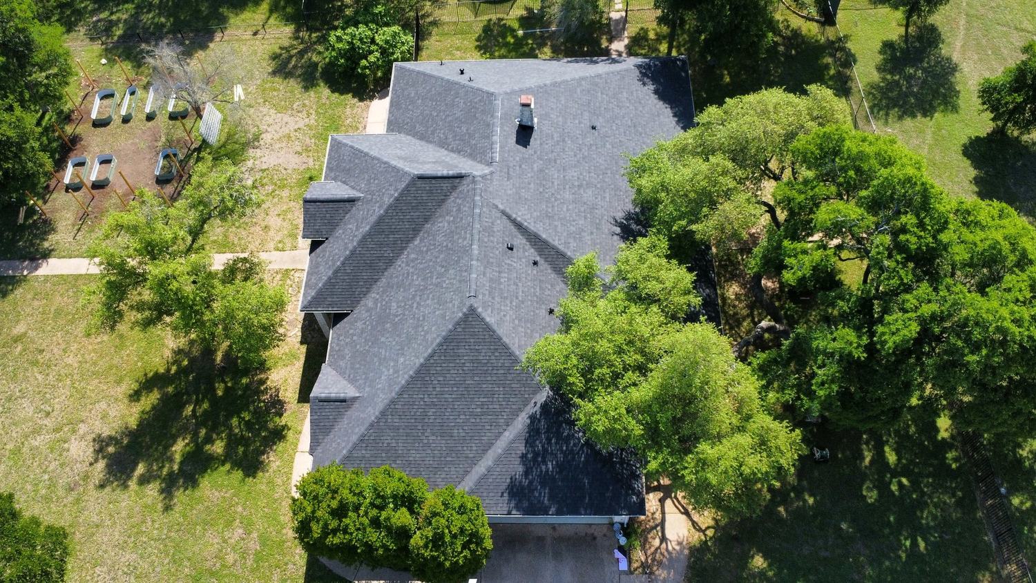 Aerial view of Central Texas residential roof work