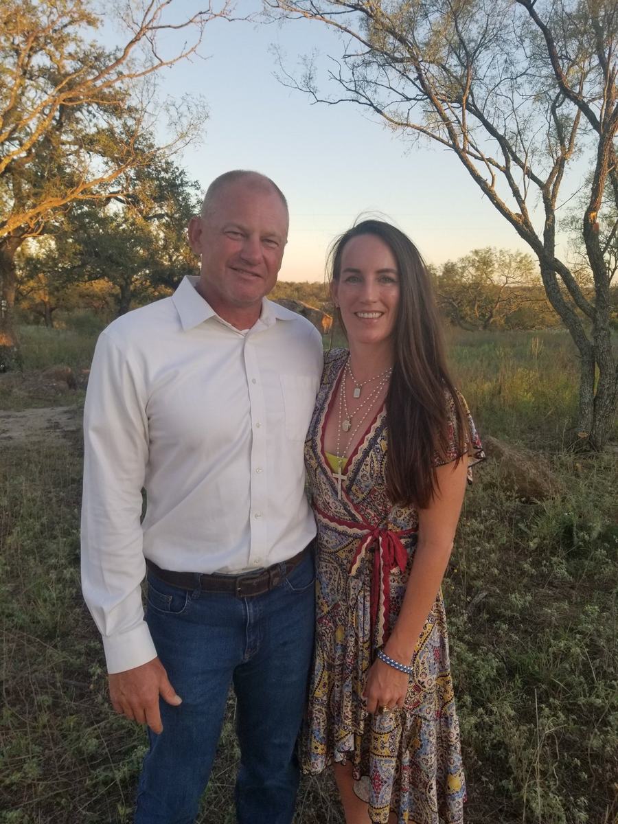 Ron and Niccole Nelson outdoors at sunset